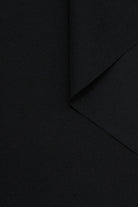 zoom matière gabardine de laine noire - Facettes Studio